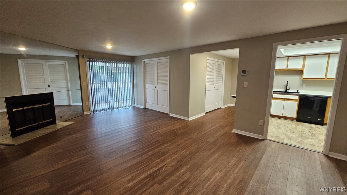306 Sundown Trail, Unit 5C Amherst, NY 14221 - Photo 9 of 23 Living Room, Dining Room with French Doors