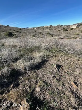 a view of ocean and mountain