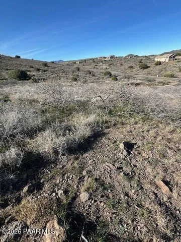 a view of ocean and mountain