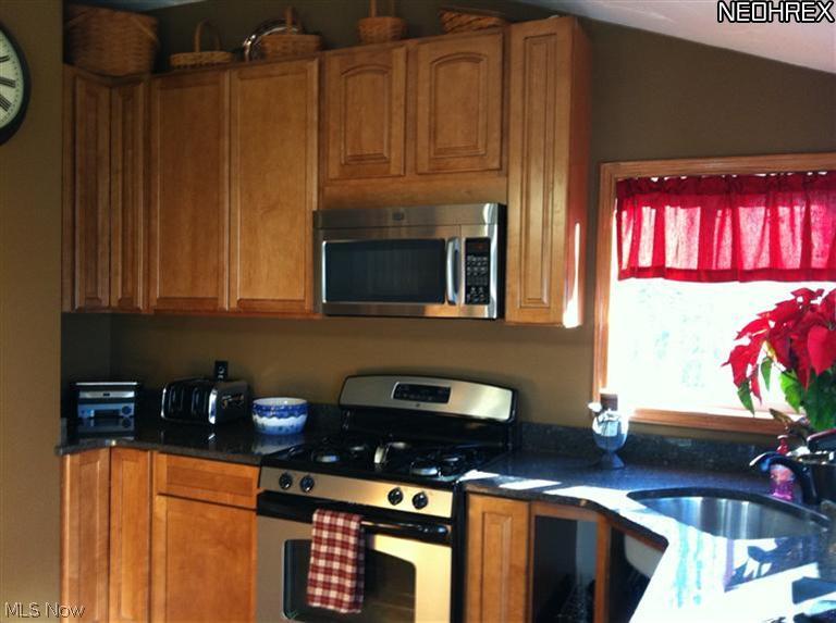 212 Marks Road Brunswick, OH 44212 - Photo 6 of 13 Granite and Stainless Kitchen