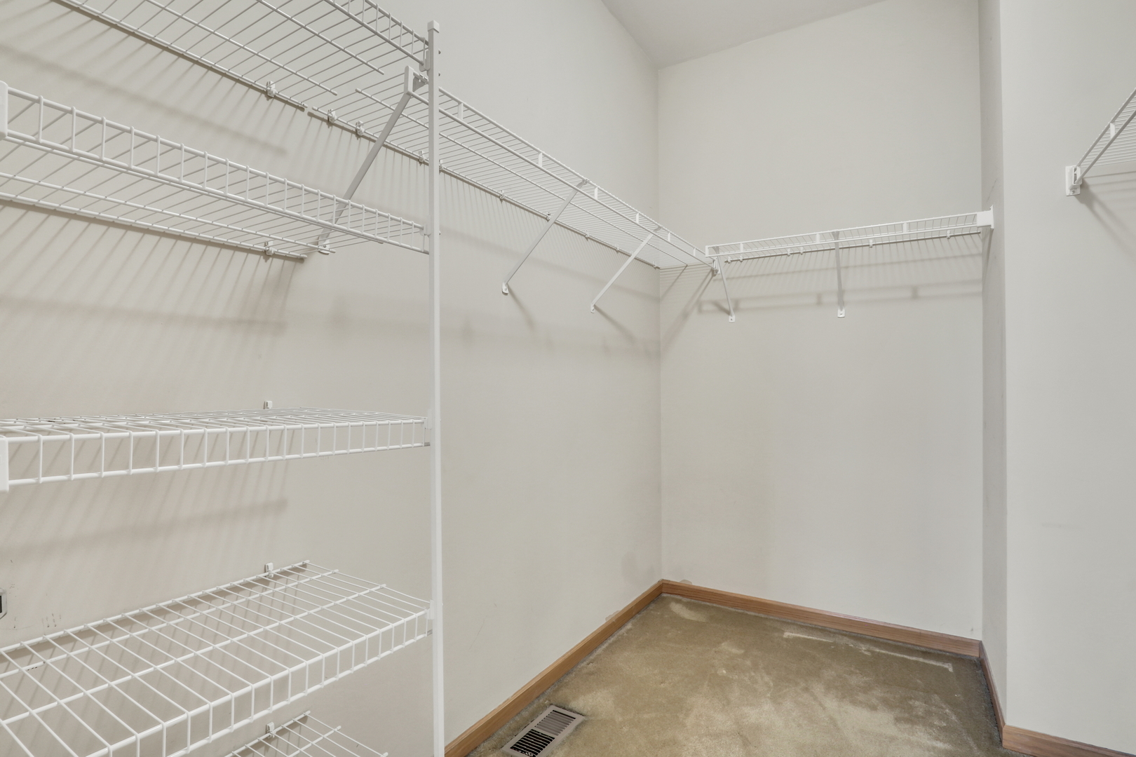 1491 Sedgewood Court Round Lake, IL 60073 - Photo 16 of 31 a view of a room with racks on the wall