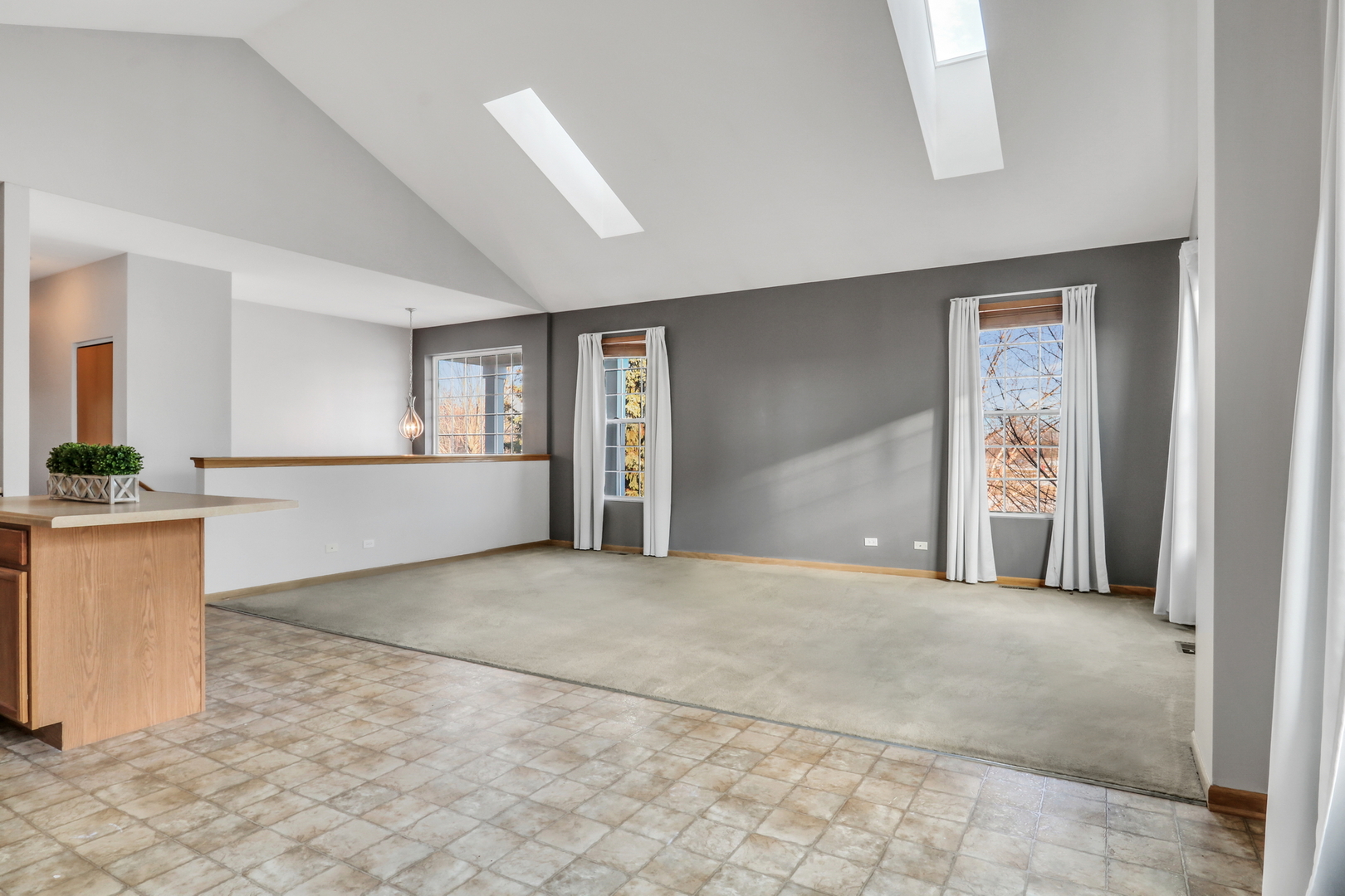 1491 Sedgewood Court Round Lake, IL 60073 - Photo 7 of 31 a view of a big room with windows and cabinet
