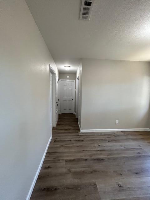 332 Cannon Drive Laurel Hill, FL 32567 - Photo 19 of 36 a view of a hallway with wooden floor