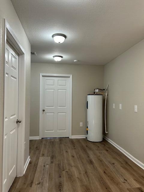 332 Cannon Drive Laurel Hill, FL 32567 - Photo 29 of 36 an empty room with wooden floor and closet