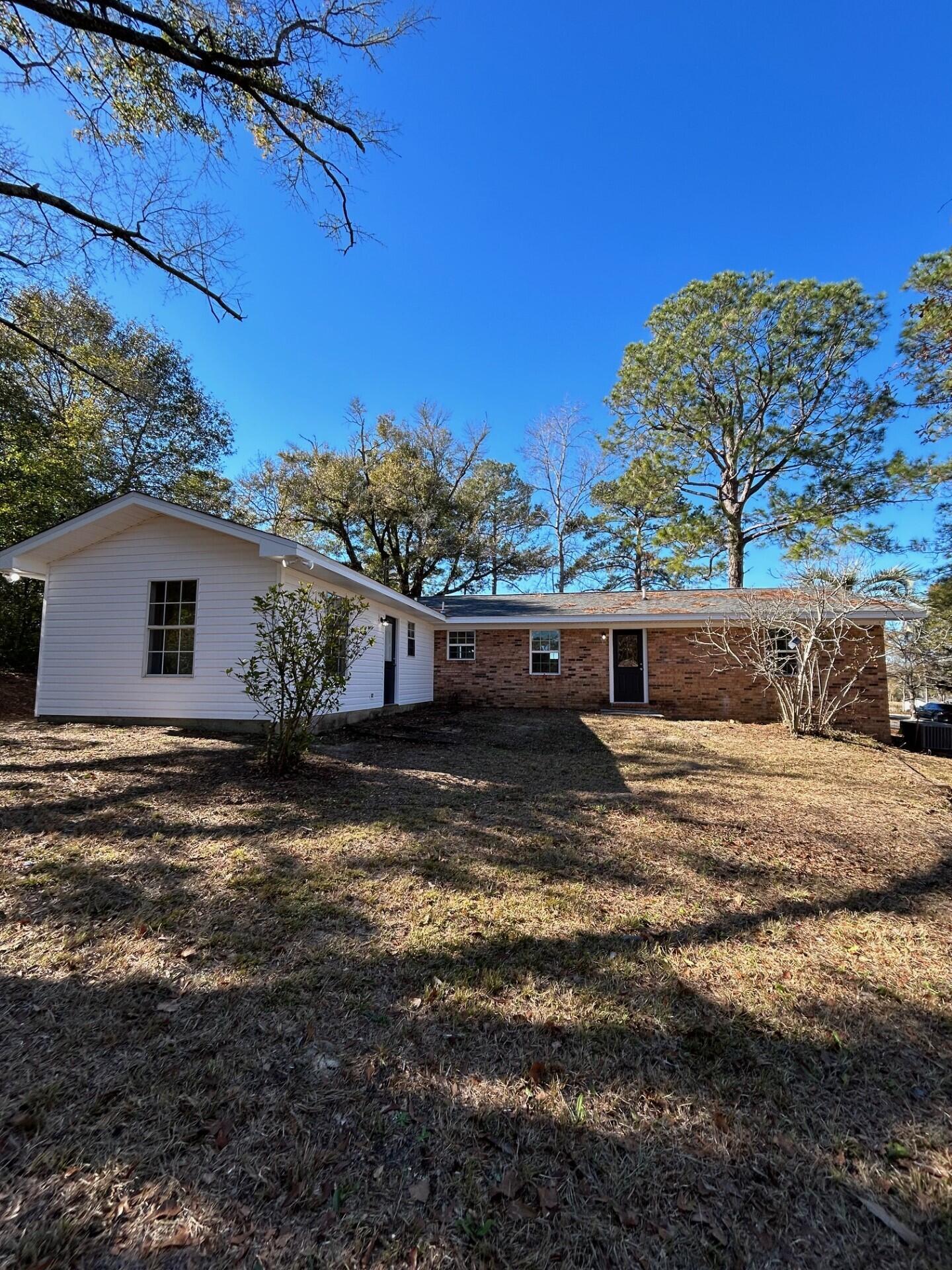 332 Cannon Drive Laurel Hill, FL 32567 - Photo 5 of 36 a view of a outdoor space with a house