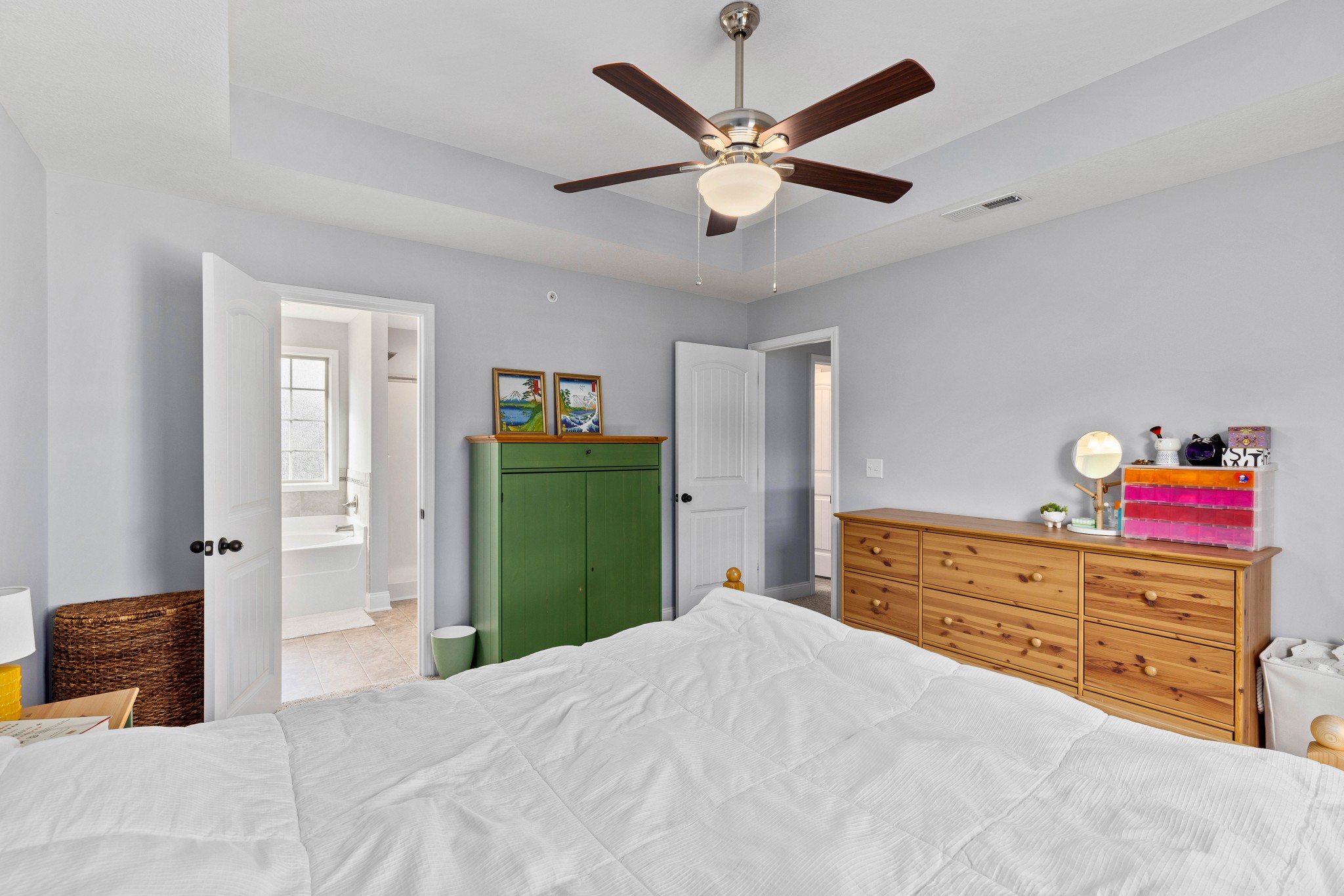 1646 Archer Drive Pleasant View, TN 37146 - Photo 16 of 33 a bedroom with a bed and a chandelier