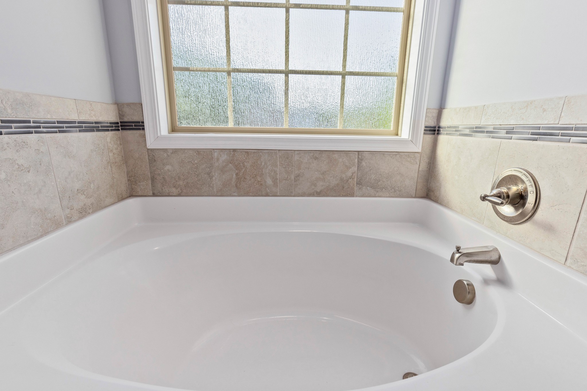 1646 Archer Drive Pleasant View, TN 37146 - Photo 19 of 33 a white bath tub sitting next to a window