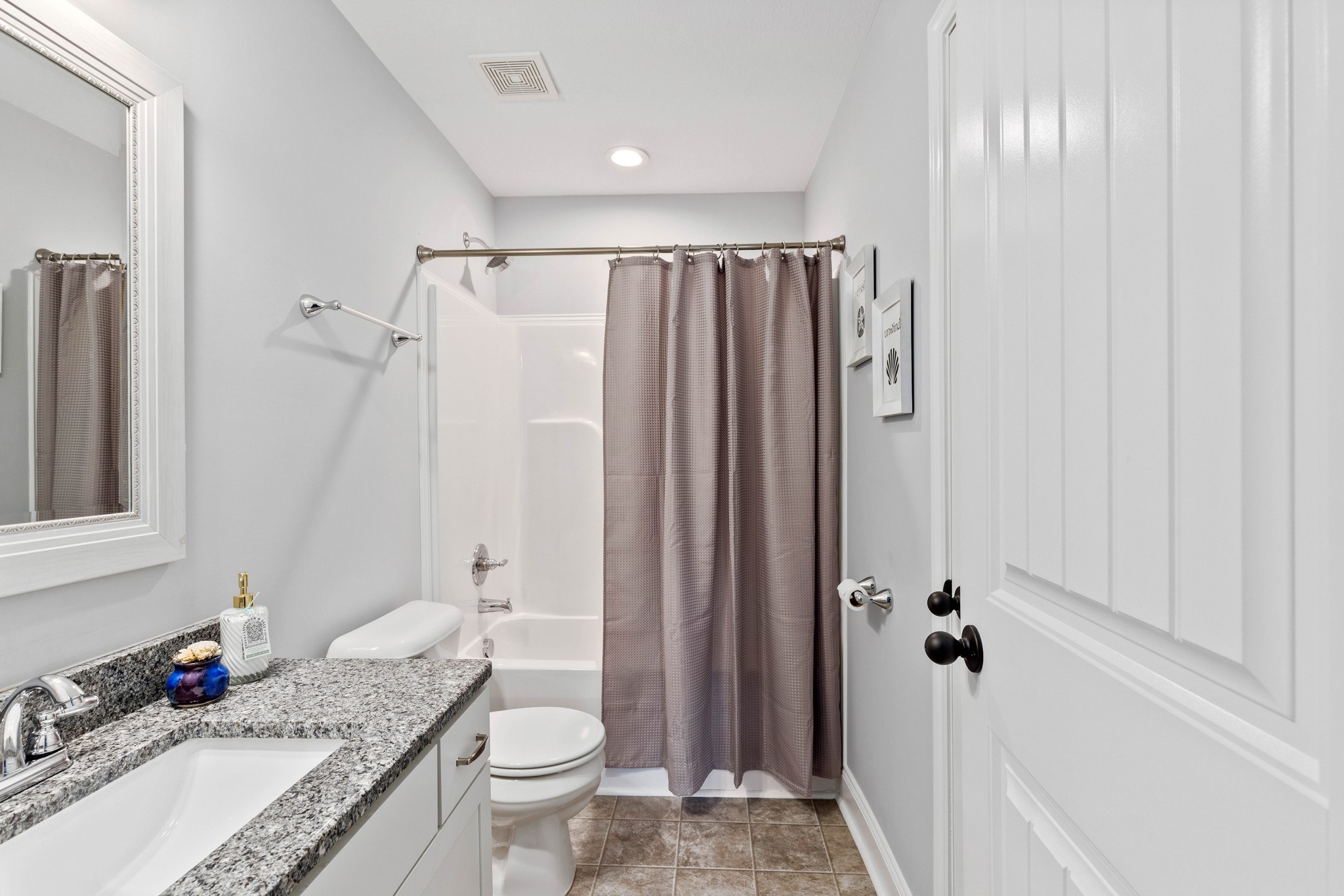 1646 Archer Drive Pleasant View, TN 37146 - Photo 23 of 33 a bathroom with a granite countertop sink toilet and shower
