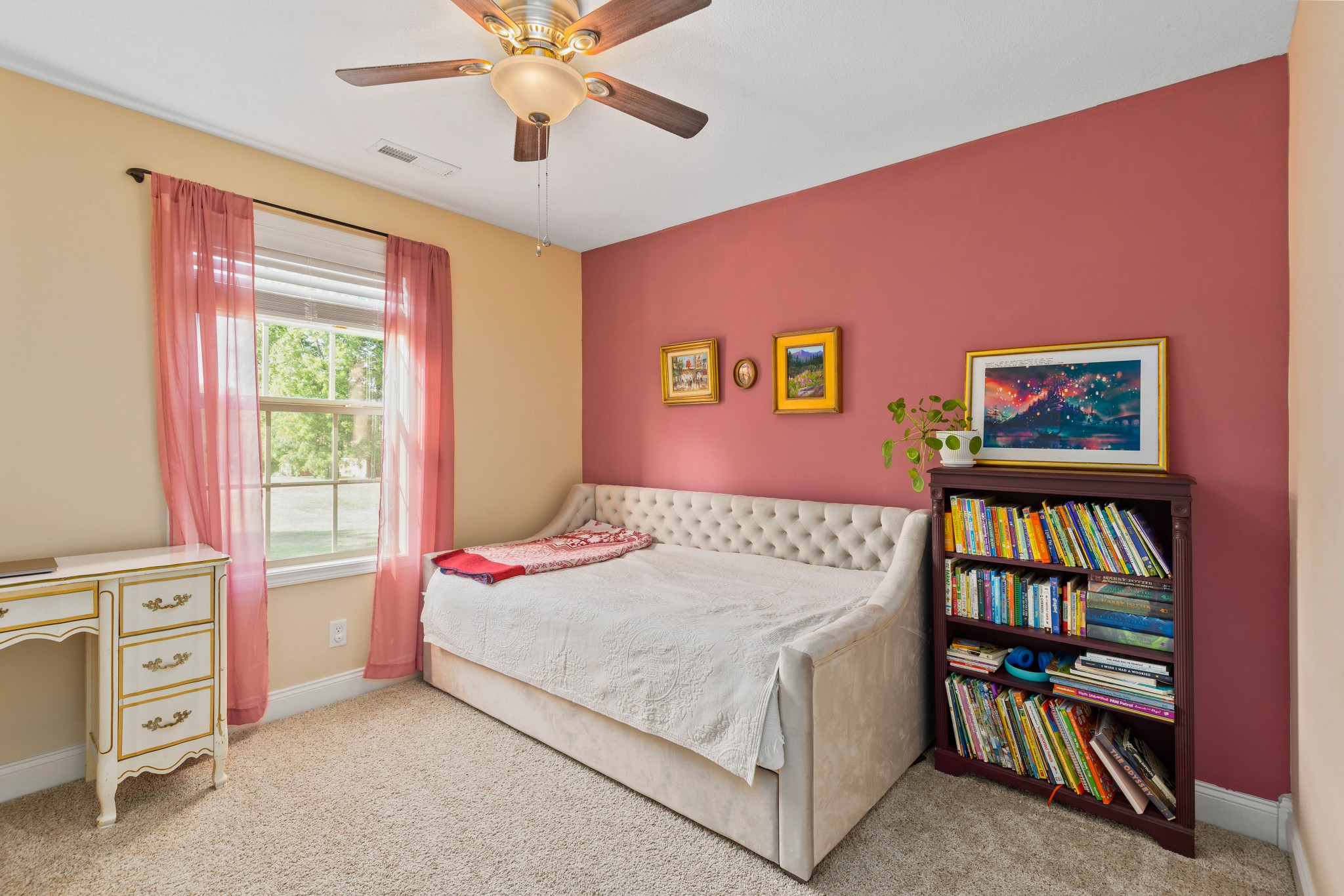 1646 Archer Drive Pleasant View, TN 37146 - Photo 24 of 33 a bedroom with a bed a dresser and a book shelf
