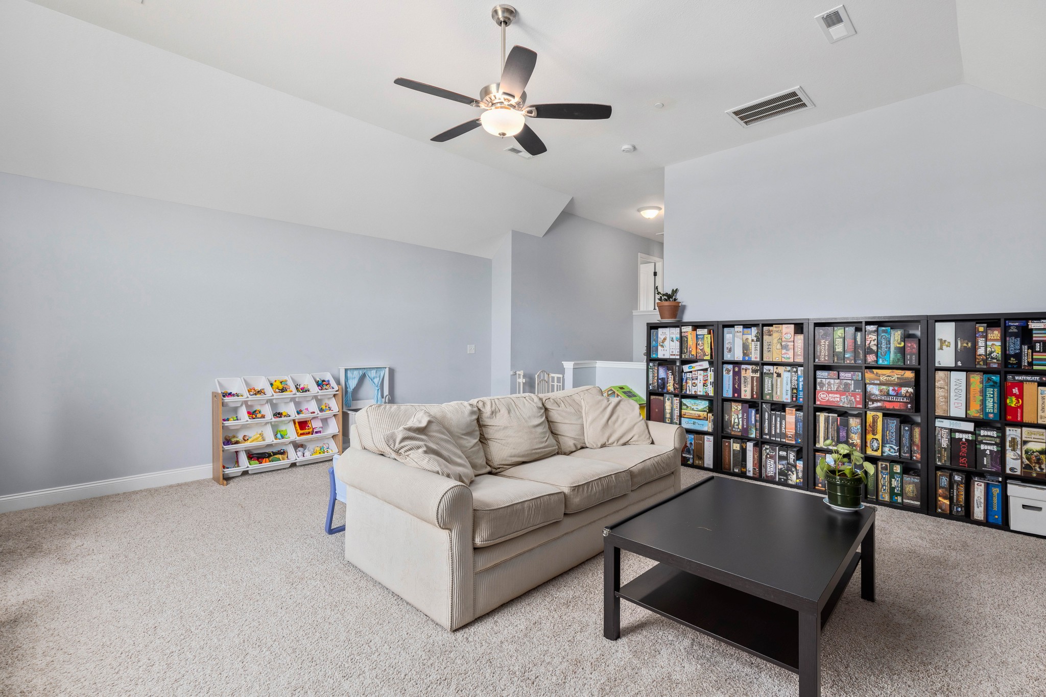 1646 Archer Drive Pleasant View, TN 37146 - Photo 28 of 33 a living room with furniture and a book shelf