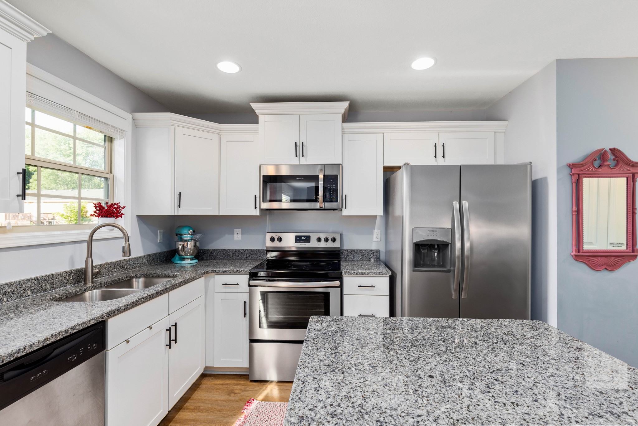 1646 Archer Drive Pleasant View, TN 37146 - Photo 10 of 33 a kitchen with kitchen island granite countertop a sink stainless steel appliances and window