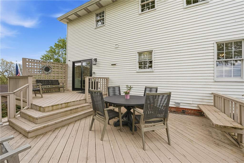 267 Forsythe Road Mars, PA 16046 - Photo 17 of 41 a view of a roof deck with table and chairs and wooden floor