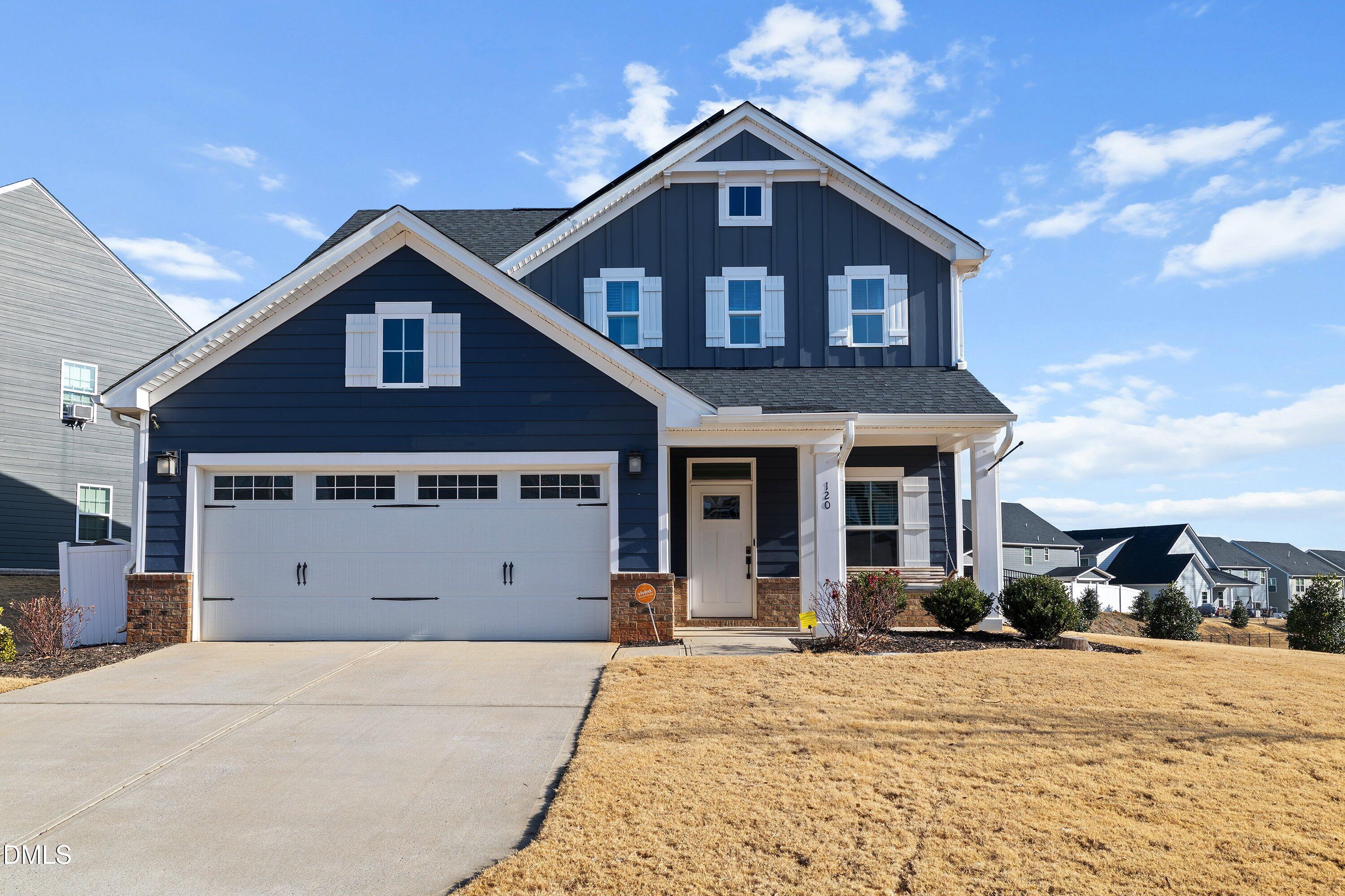 120 Misty Pike Drive Raleigh, NC 27603 - Photo 2 of 57 a view of a house with snow on the road