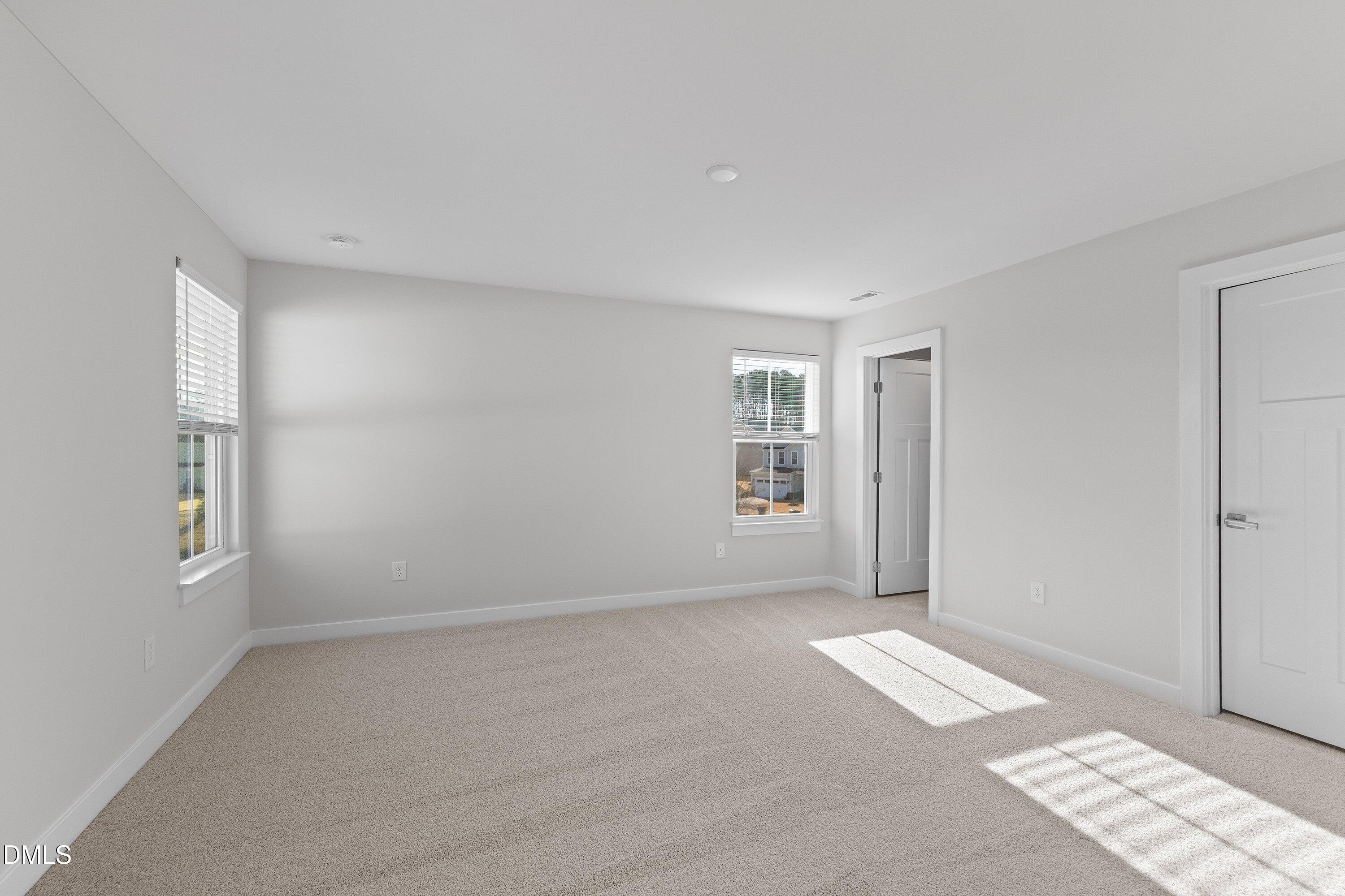 120 Misty Pike Drive Raleigh, NC 27603 - Photo 24 of 57 a view of an empty room with a window