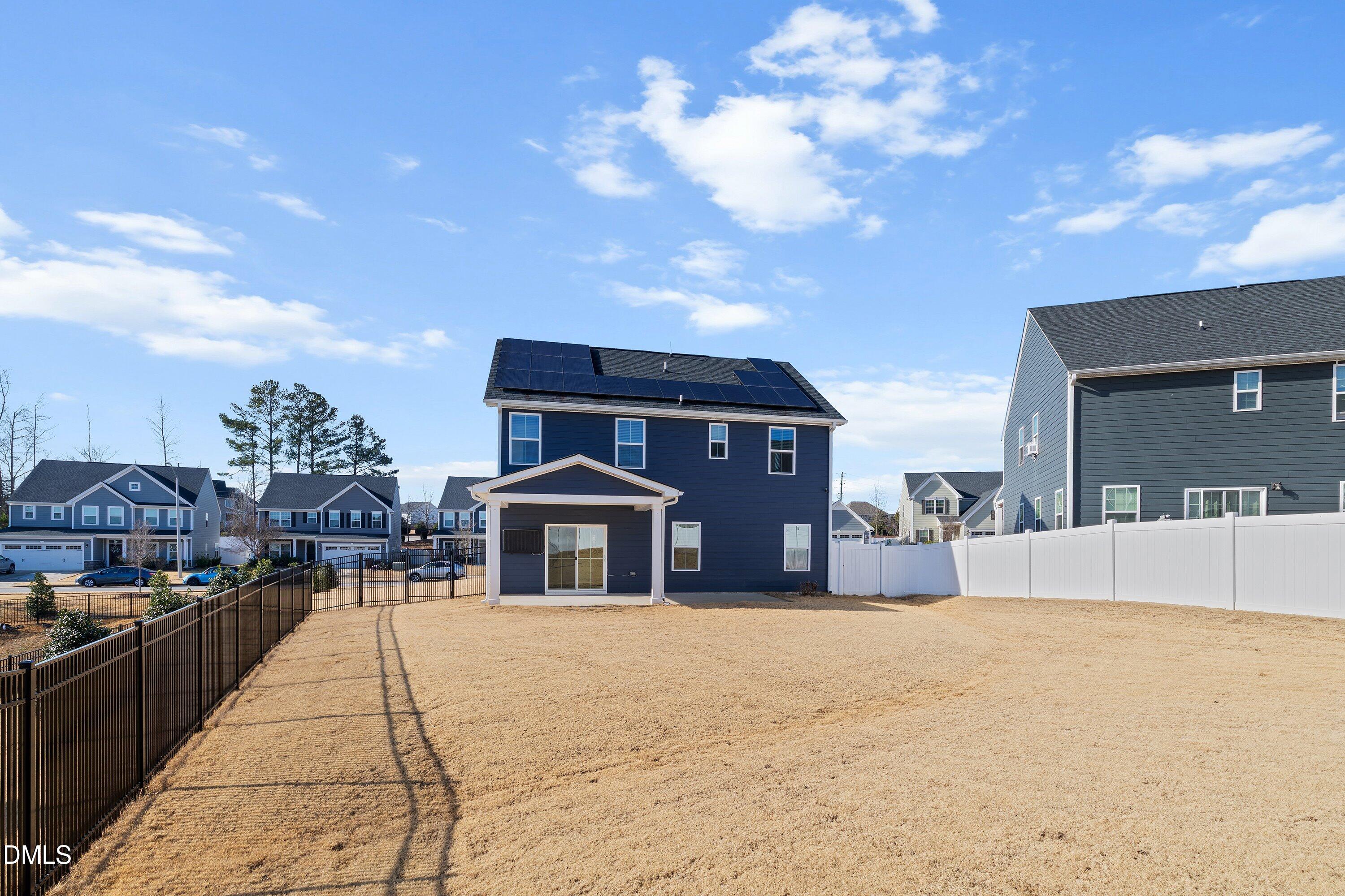120 Misty Pike Drive Raleigh, NC 27603 - Photo 39 of 57 a swimming pool with buildings in the background