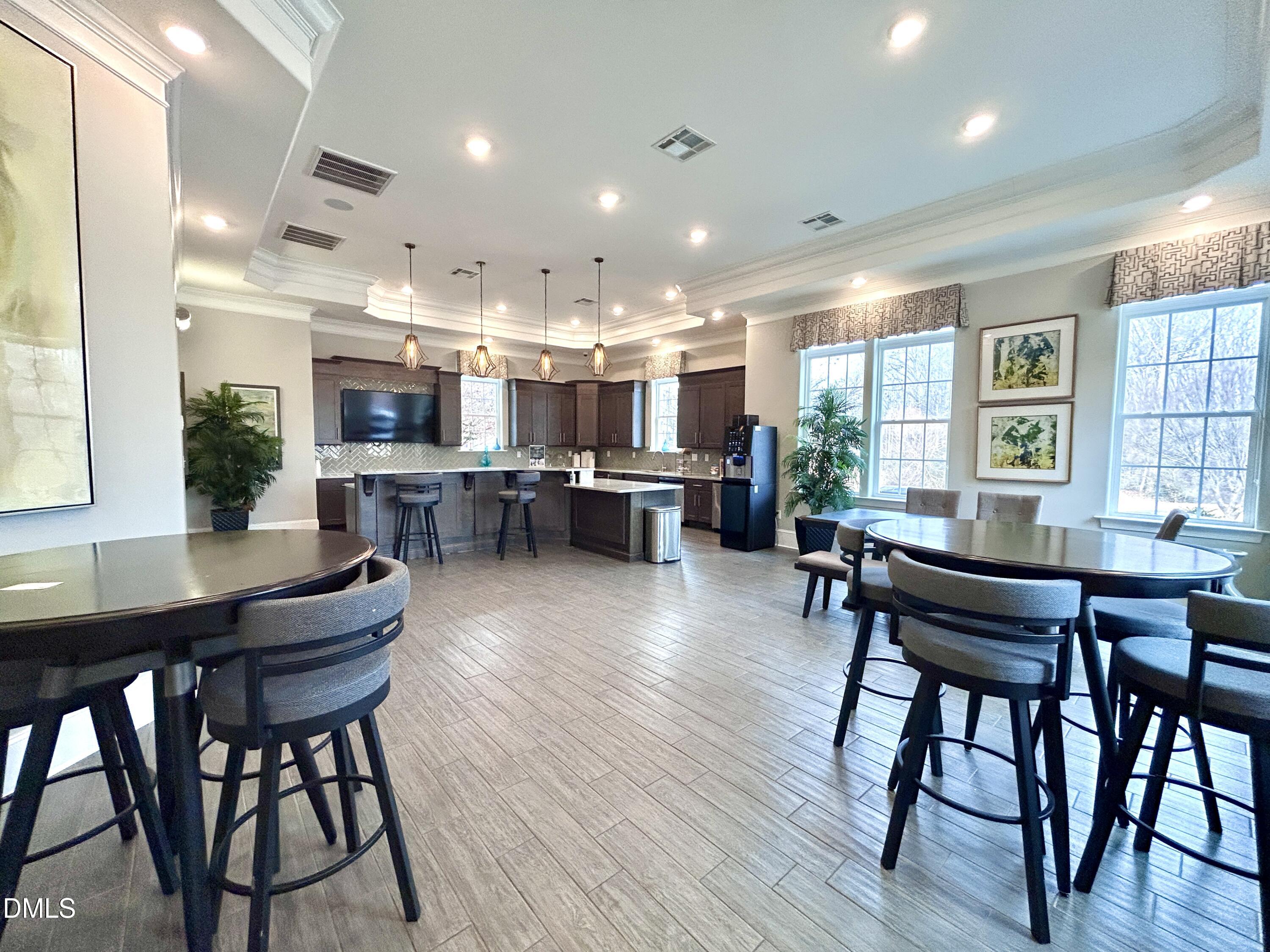 120 Misty Pike Drive Raleigh, NC 27603 - Photo 45 of 57 a view of a dining room with furniture window and wooden floor