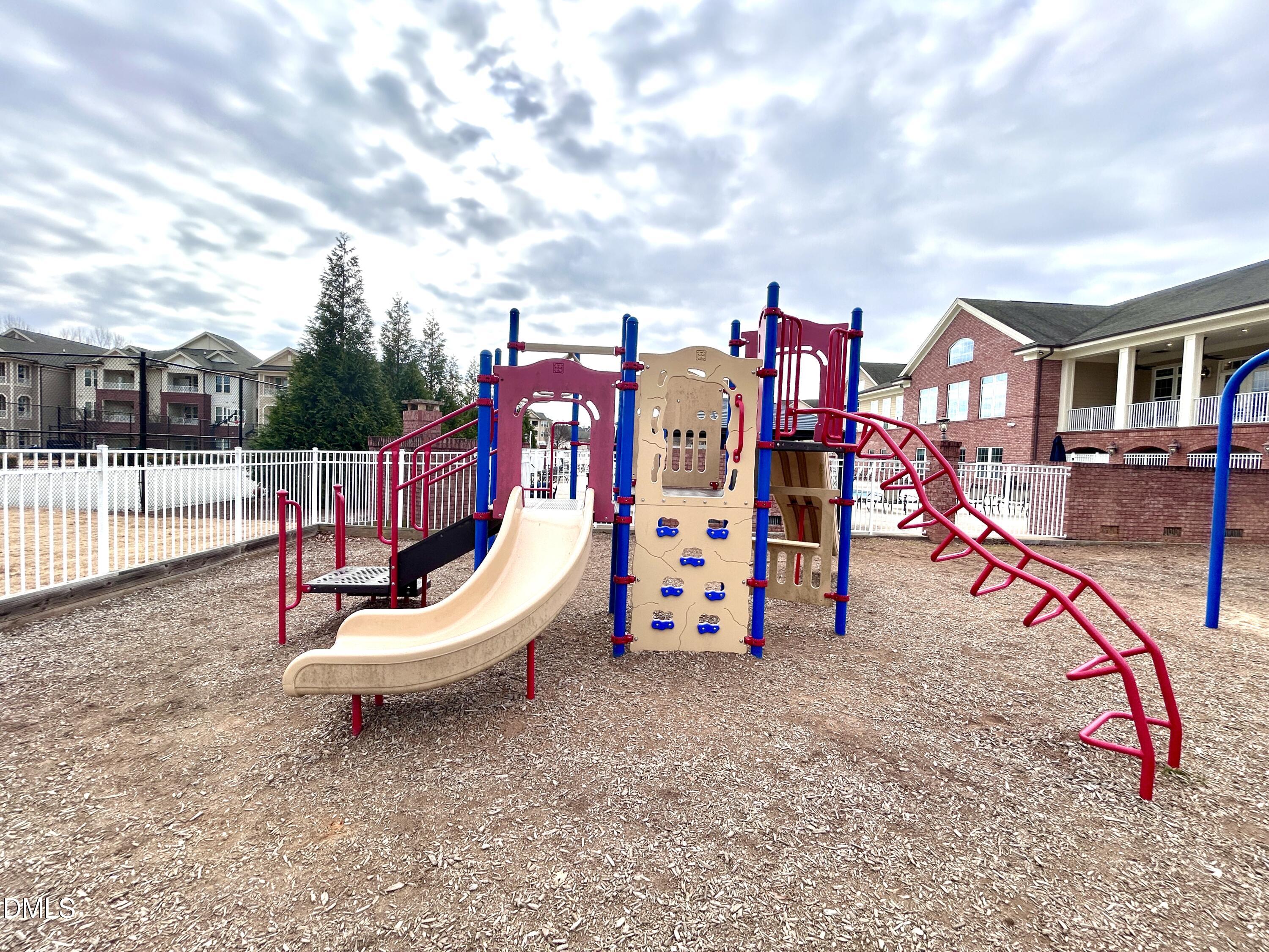 120 Misty Pike Drive Raleigh, NC 27603 - Photo 49 of 57 a view of a park with iron fence