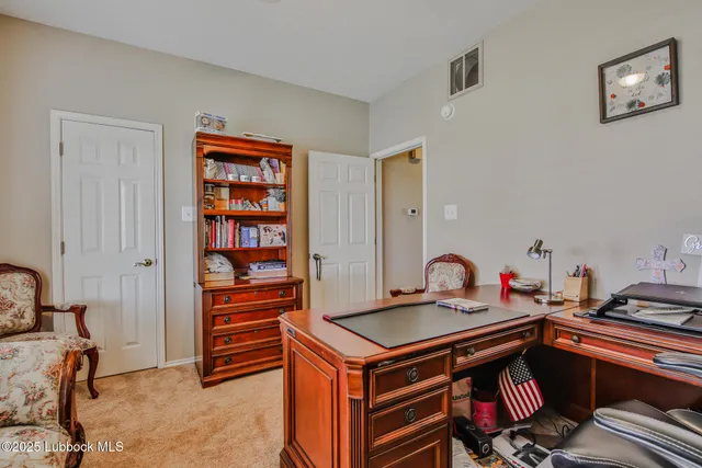 a bedroom with a bed and furniture