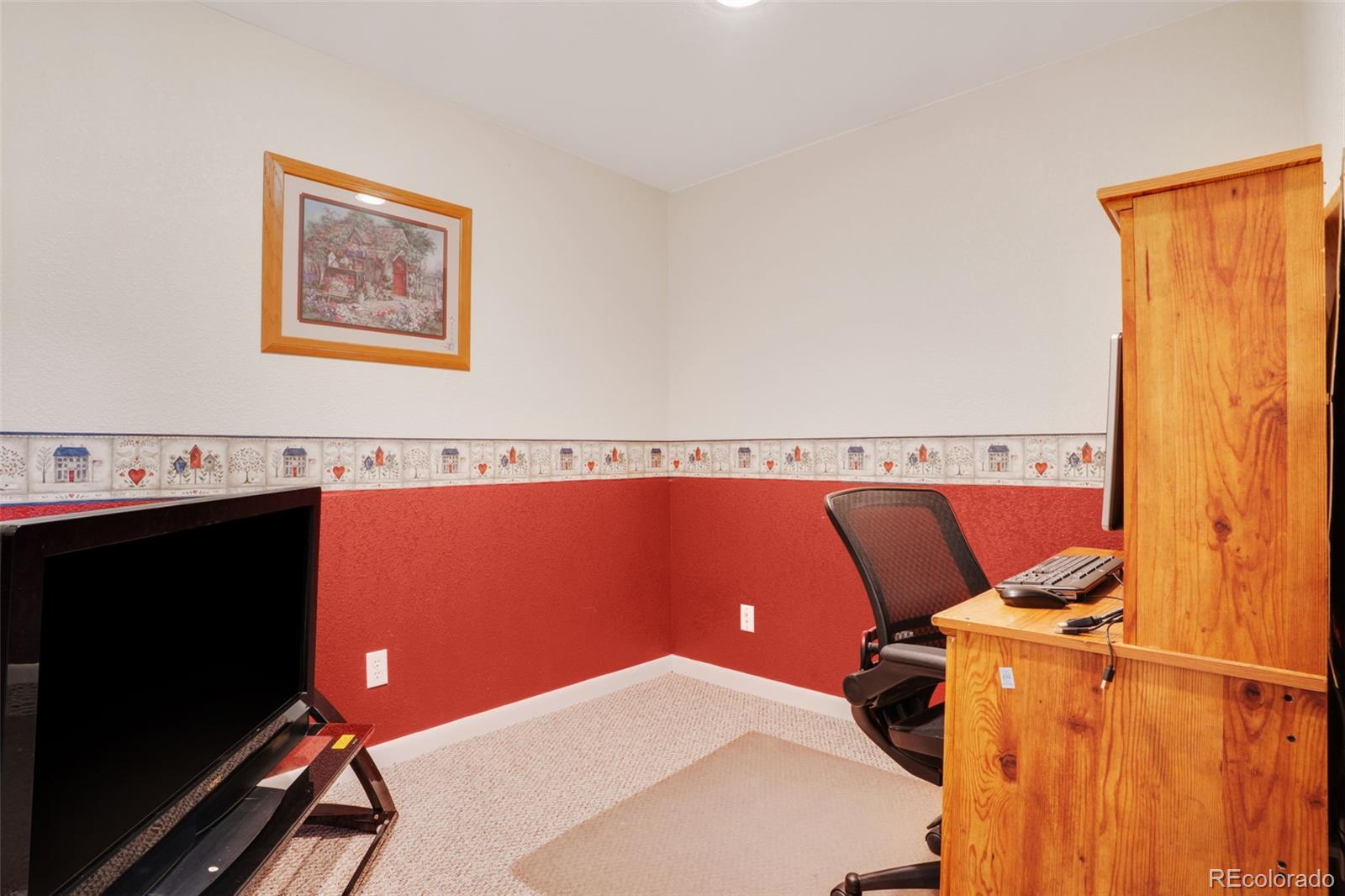 210 South Elm Street Bennett, CO 80102 - Photo 22 of 31 a view of a workspace with furniture