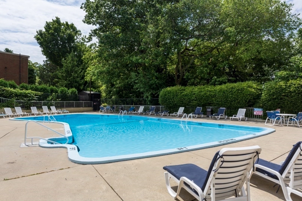 111 Perkins Street, Unit 261 Boston, MA 02130 - Photo 15 of 16 a view of a swimming pool with a patio