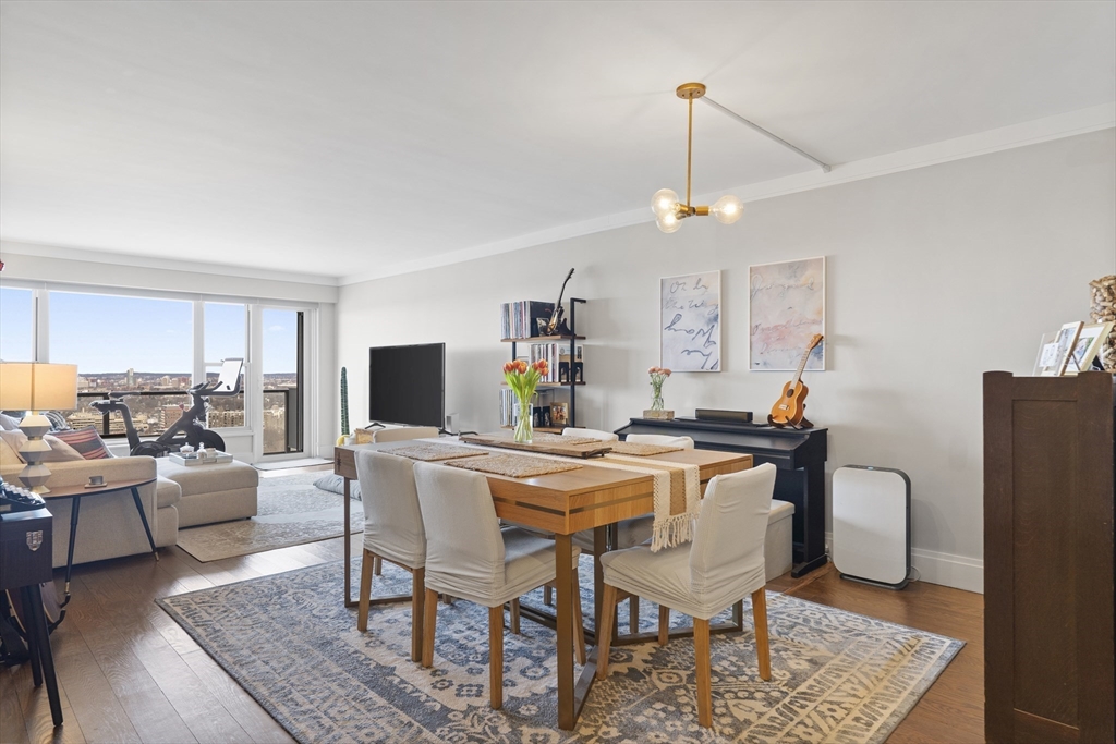 111 Perkins Street, Unit 261 Boston, MA 02130 - Photo 5 of 16 a view of a dining room with furniture