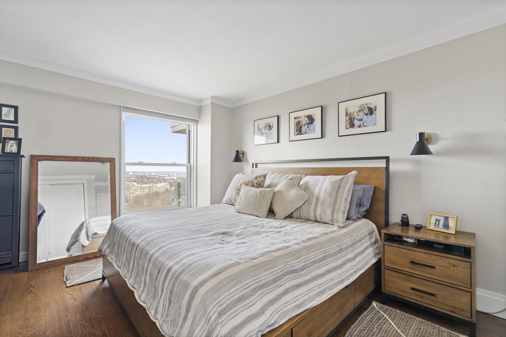 111 Perkins Street, Unit 261 Boston, MA 02130 - Photo 7 of 16 a bedroom with a bed and a window