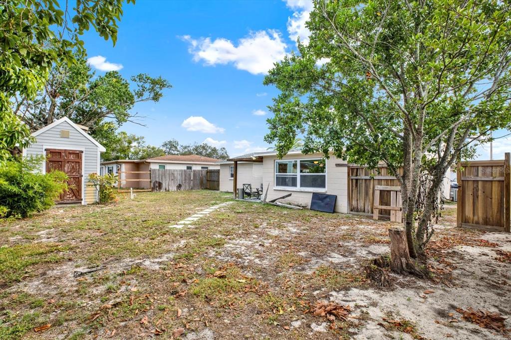 7415 Mayfield Drive Port Richey, FL 34668 - Photo 13 of 17 a view of a house with a yard