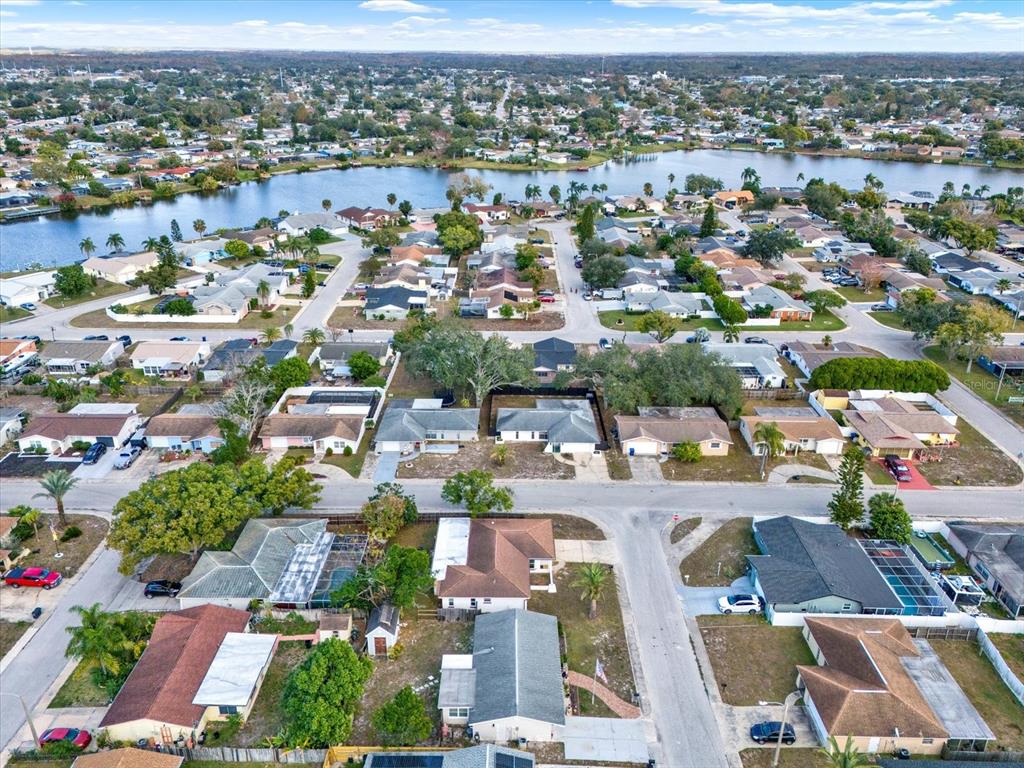 7415 Mayfield Drive Port Richey, FL 34668 - Photo 16 of 17 an aerial view of a city with lots of residential buildings