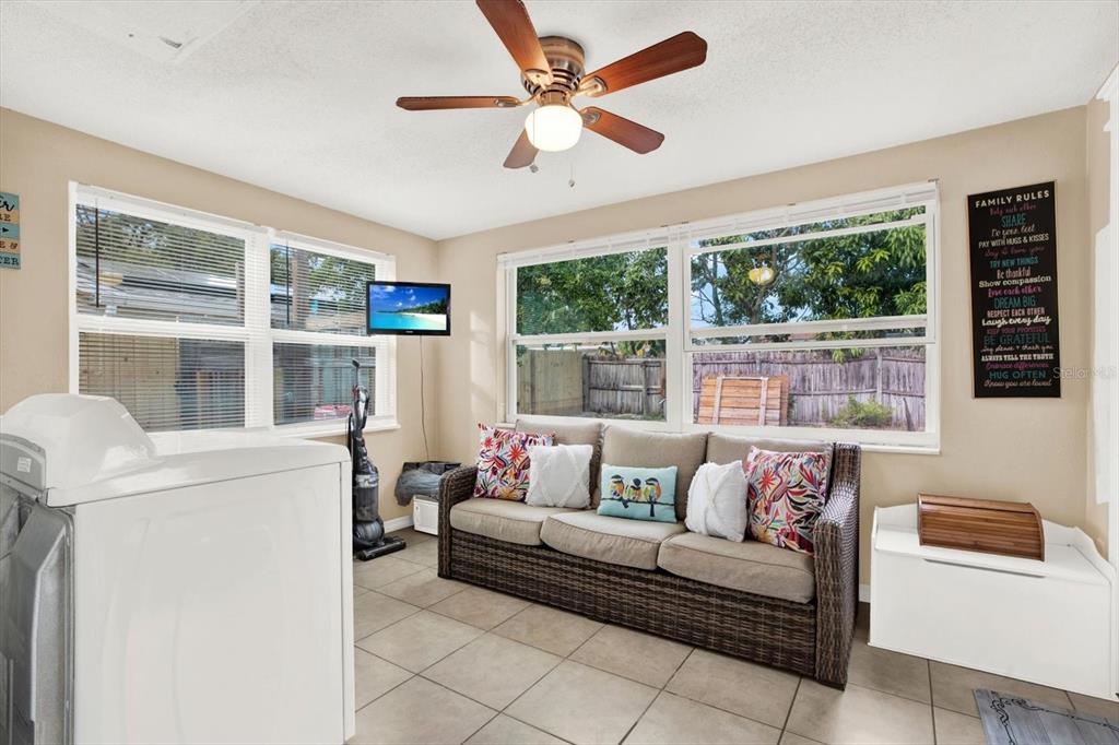 7415 Mayfield Drive Port Richey, FL 34668 - Photo 7 of 17 a living room with furniture and a window