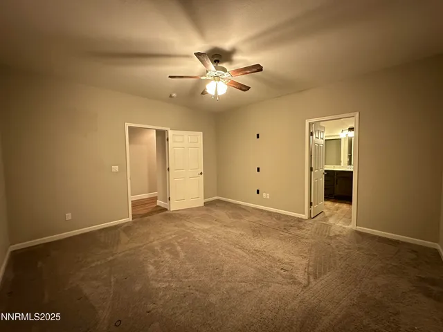 a bathroom with a sink a toilet and vanity