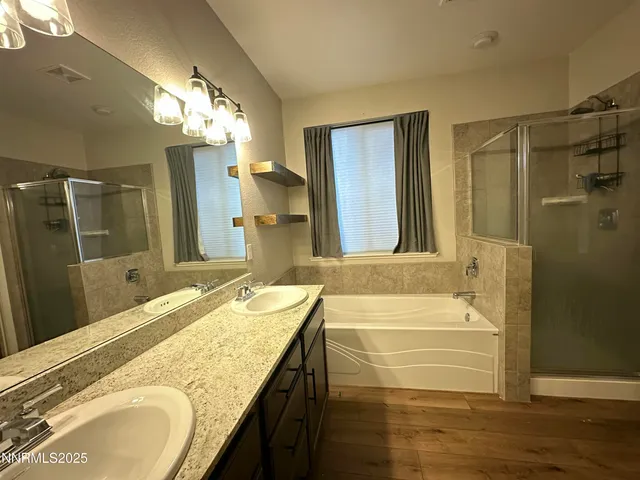 a bathroom with a sink toilet and vanity
