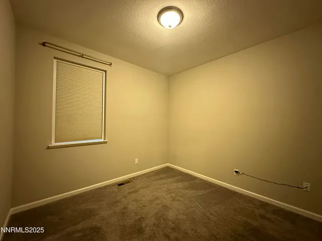 an empty room with a workbench