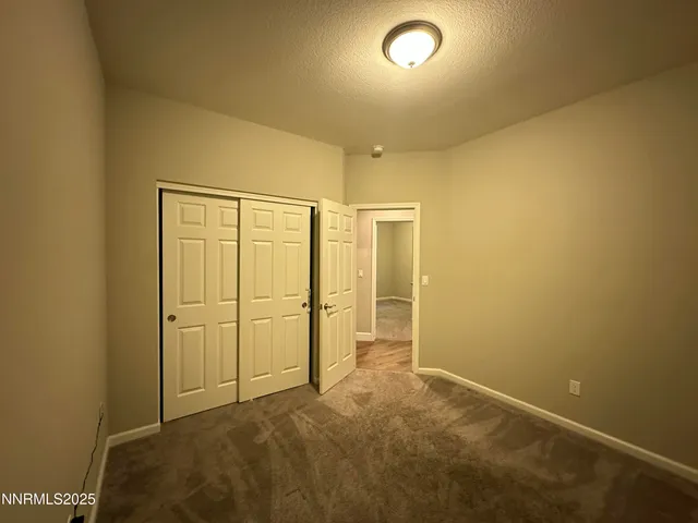 a view of a garage with storage