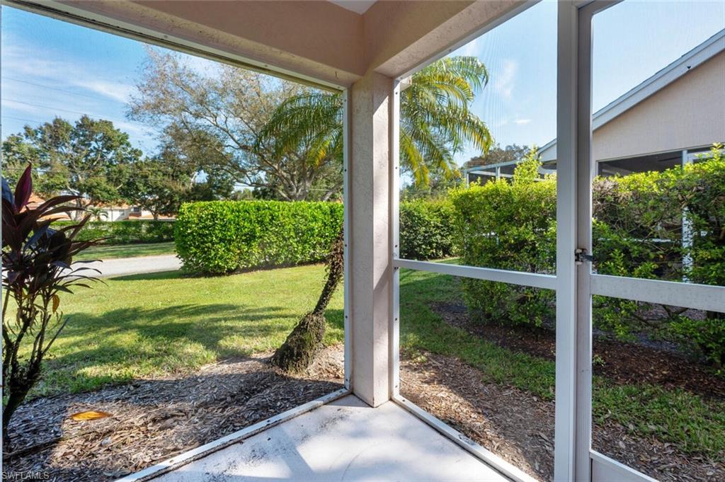 2835 Mizzen Way Naples, FL 34109 - Photo 22 of 46 a view of a back yard from a window