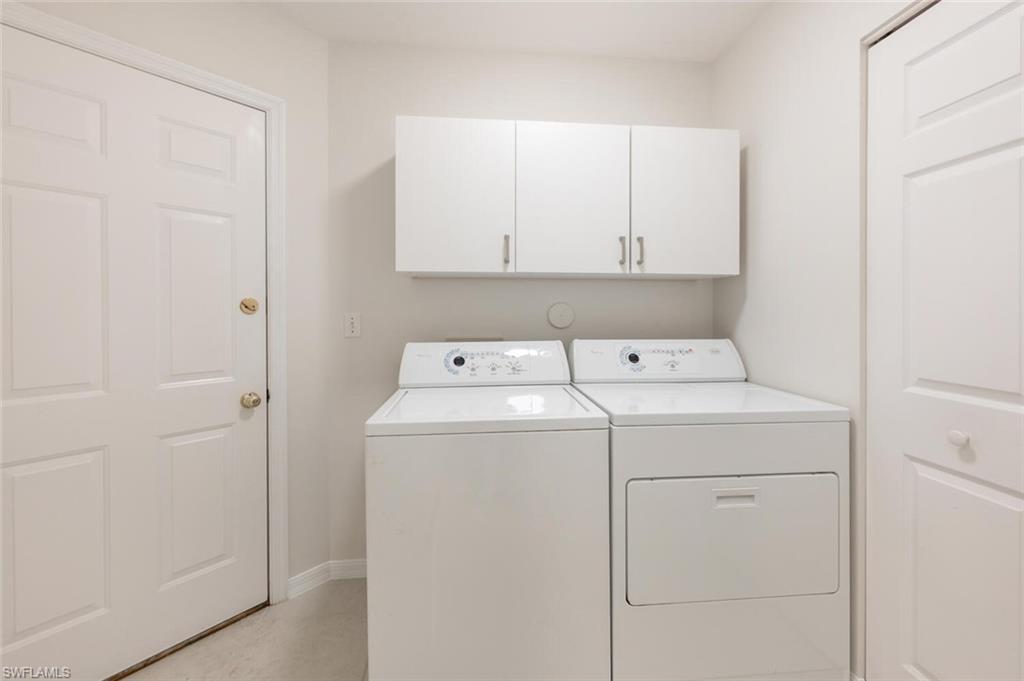 2835 Mizzen Way Naples, FL 34109 - Photo 30 of 46 a utility room with dryer and washer