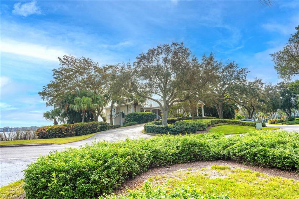 2835 Mizzen Way Naples, FL 34109 - Photo 32 of 46 a view of a backyard with large trees
