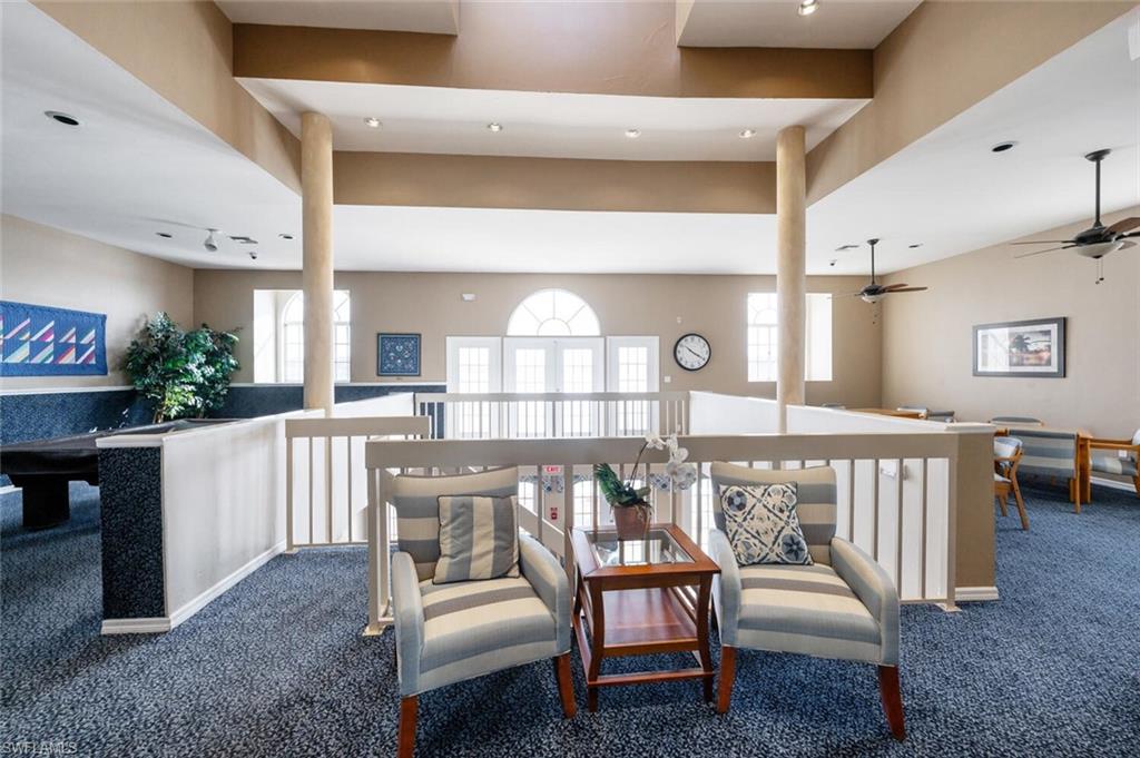 2835 Mizzen Way Naples, FL 34109 - Photo 37 of 46 a dining room with furniture and a floor to ceiling window