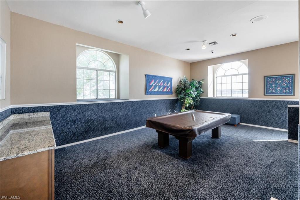 2835 Mizzen Way Naples, FL 34109 - Photo 39 of 46 a room with pool table and windows