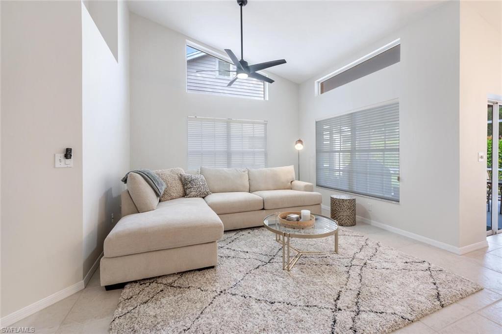 2835 Mizzen Way Naples, FL 34109 - Photo 4 of 46 a living room with furniture and a window