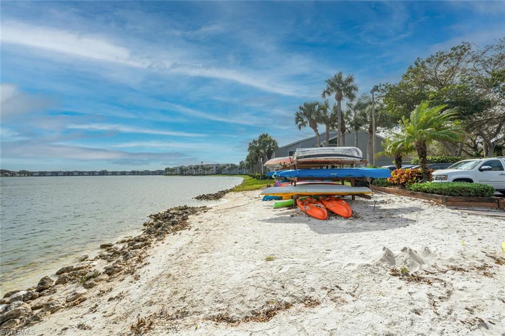 2835 Mizzen Way Naples, FL 34109 - Photo 44 of 46 a view of a lake with an outdoor space