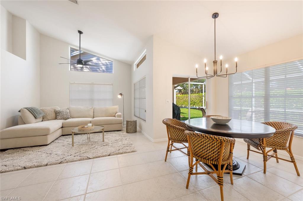 2835 Mizzen Way Naples, FL 34109 - Photo 7 of 46 a living room with furniture and a window