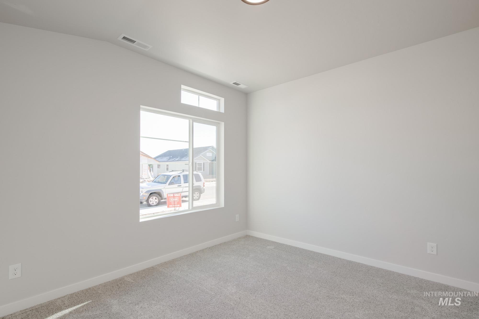 7472 South Menzingers Avenue Meridian, ID 83642 - Photo 15 of 22 Carpeted empty room with baseboards