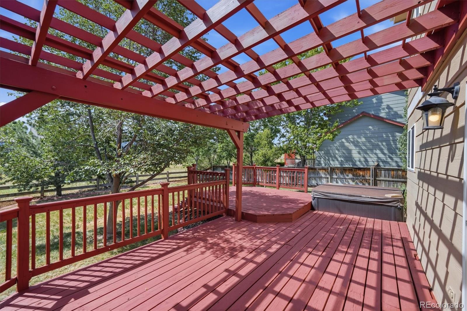 9629 Burberry Way Highlands Ranch, CO 80129 - Photo 35 of 50 a view of a backyard