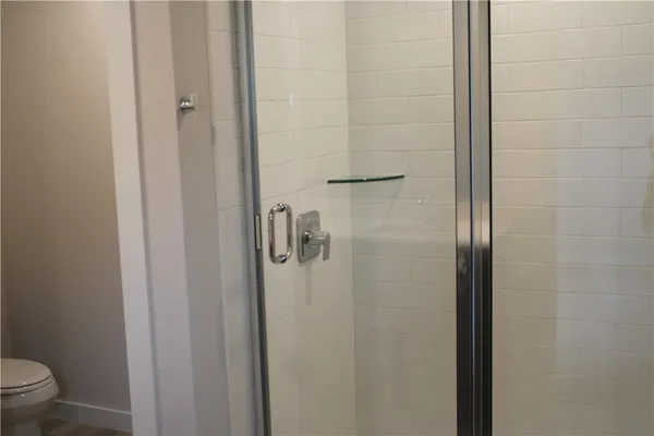 a bathroom with a granite countertop sink