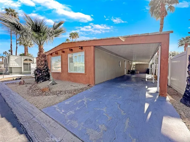 a view of a house with a patio