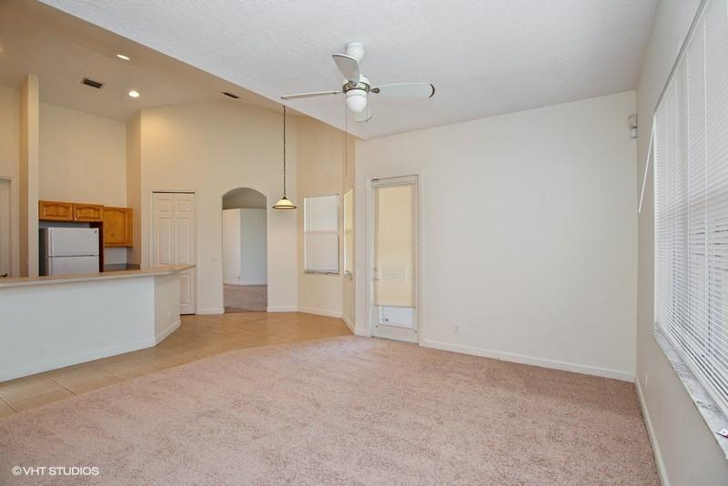 549 Southwest Aster Road Port St. Lucie, FL 34953 - Photo 3 of 12 05_549SWAsterRoad_92_KitchenDiningRoom_F
