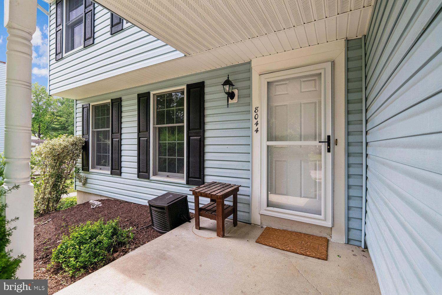 8044 Red Jacket Way Jessup, MD 20794 - Photo 4 of 71 COVERED FRONT ENTRY PORCH W/ STORM DOOR
