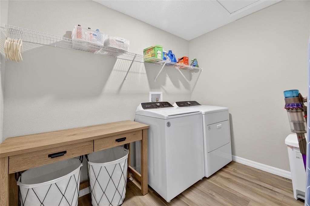 12908 Hawkstone Trail Boulevard Lithia, FL 33547 - Photo 37 of 76 a utility room with dryer and washer