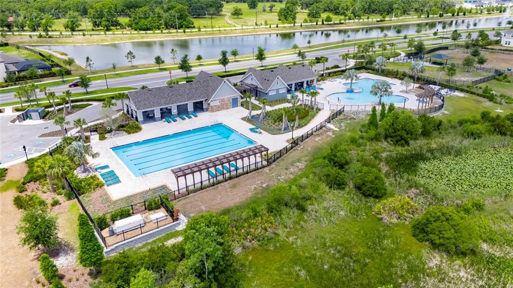 12908 Hawkstone Trail Boulevard Lithia, FL 33547 - Photo 57 of 76 an aerial view of a house with outdoor space swimming pool and outdoor seating