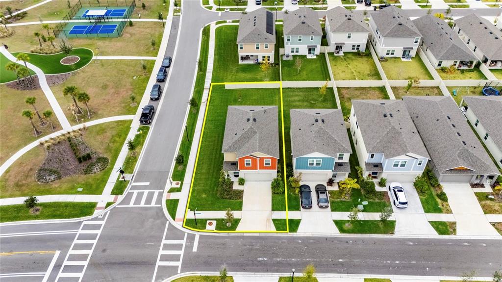 12908 Hawkstone Trail Boulevard Lithia, FL 33547 - Photo 69 of 76 an aerial view of residential houses with outdoor space and parking